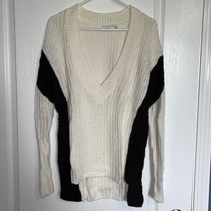 Women’s L black & white Lush v-neck sweater.
